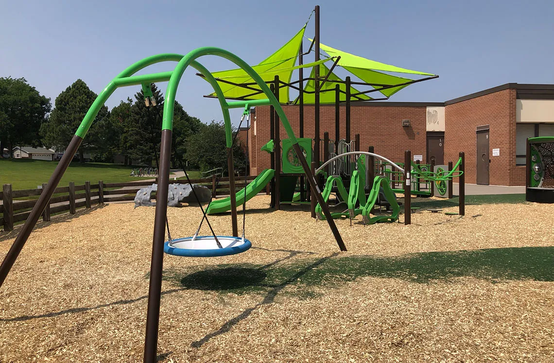 Round swing at Walnut Hills Preschool Playground